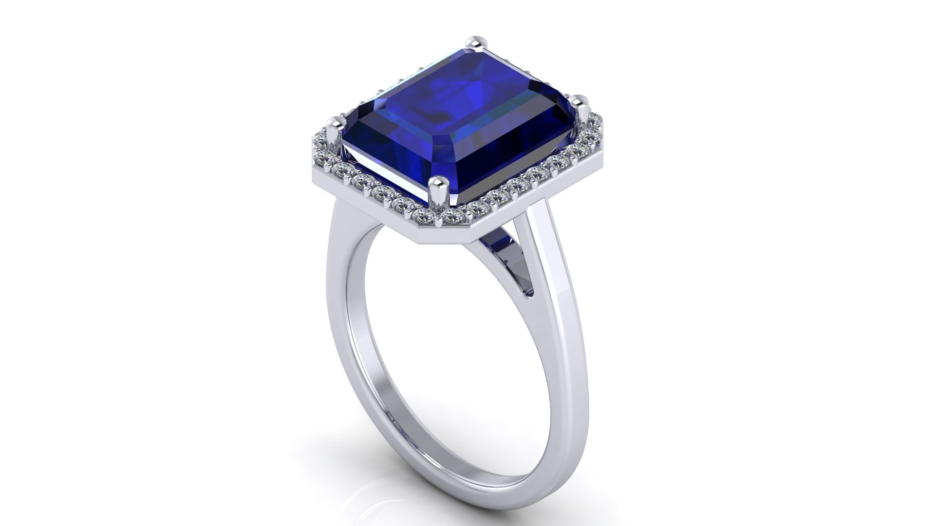 Anillo con zafiro central corte esmeralda y halo de diamantes - Fernanda
