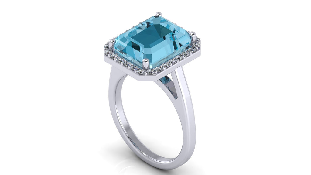 Anillo con topacio central corte esmeralda y halo de diamantes - Josefa