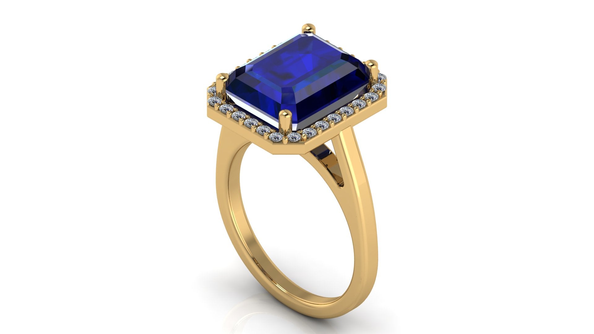 Anillo con zafiro central corte esmeralda y halo de diamantes - Fernanda