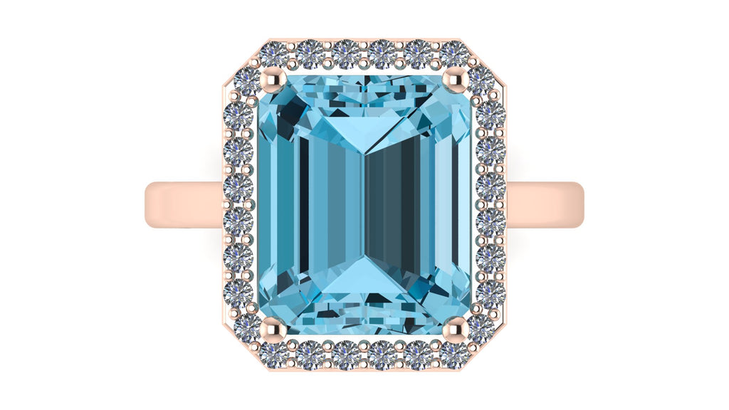 Anillo con topacio central corte esmeralda y halo de diamantes - Josefa